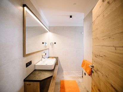 Luxuscamping - barrierefreier Zugang ins Wasser - Badezimmer Apartment "Garten" - Camping Passeier