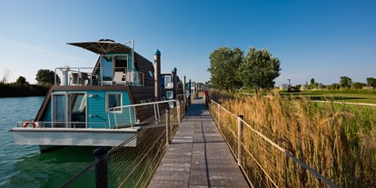 Luxuscamping - Umgebungsschwerpunkt: Strand - Houseboat River am Fluss Tagliamento - Marina Azzurra Resort