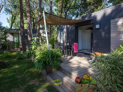Luxuscamping - Kategorie der Anlage: 4 - Mobilheim Taos von außen - Camping Ma Prairie