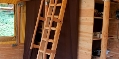 Luxuscamping - Art der Unterkunft: Lodgezelt - Region Jura - Zelt Toile & Bois Zenith - Innen - Camping Huttopia Divonne Zelt Toile & Bois Zenith für 6 Pers. auf Camping Huttopia Divonne