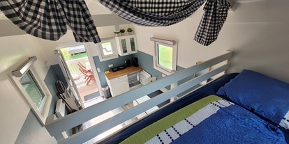 Luxuscamping - Preisniveau: moderat - Blick vom Stockbett nach unten
 - Camping Santa Monica Woody