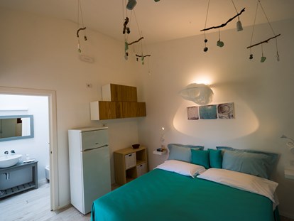 Luxuscamping - Costa del Sud - Superior-Einzimmer-Bungalow - Tiliguerta Glamping & Camping Village Superior-Einzimmer-Bungalows