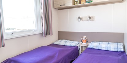Luxuscamping - Preisniveau: moderat - Kinderschlafzimmer - Camping & Ferienpark Orsingen Mobilheime im Camping & Ferienpark Orsingen