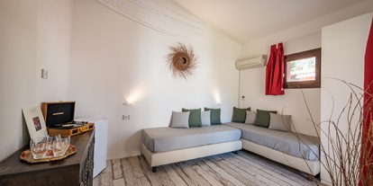 Luxuscamping - Klimaanlage - Italien - Tiliguerta Glamping & Camping Village Deluxe-Zweizimmer-Bungalows