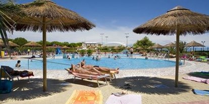Luxuscamping - Terrasse - Venetien - Am Pool - Villaggio Turistico Internazionale Villa Adria auf Villaggio Turistico Internazionale