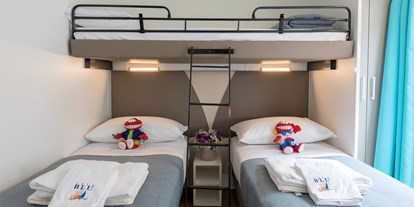 Luxuscamping - getrennte Schlafbereiche - Cavallino - Kinderbettzimmer - Camping Vela Blu Mobilheim Laguna Platinum auf Camping Vela Blu
