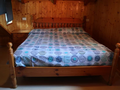 Luxury camping - Doppelbett im Bungalow auf Camping Montorfano  - Camping Montorfano Bungalows
