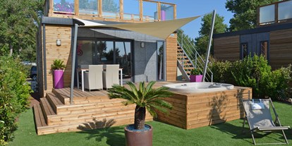 Luxuscamping - Languedoc-Roussillon - Camping Naturiste Centre Hélio Marin Rene Oltra Luxus Cottages auf Camping Naturiste Centre Hélio Marin Rene Oltra