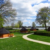 Luxuscamping: direkte Seelage - unsere Kotas im Wikingerdorf - Chalets/ Mobilheime: Trekkinghütte Cottage