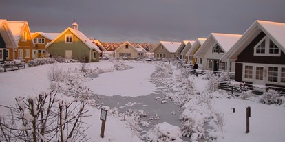 Luxuscamping - Terrasse - PLZ 29649 (Deutschland) - Winter Sonnenuntergang - Südsee-Camp Ferienhaus Stockholm am Südsee-Camp