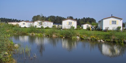 Luxuscamping - Gartenmöbel - Lüneburger Heide - Chalet am Biotop - Südsee-Camp Chalet Typ 1 am Südsee-Camp