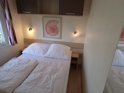 Luxuscamping - getrennte Schlafbereiche - Mobilheime direkt an der Ostsee Mobilheim mit Seeblick