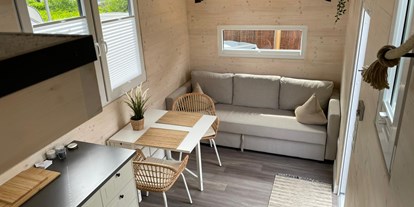 Luxuscamping - Terrasse - Innenansicht Tinyhouse - Campingpark Heidewald Campingpark Heidewald