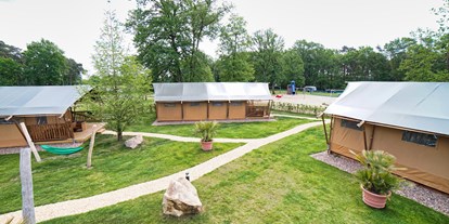 Luxuscamping - Terrasse - Unser ganz neues Glampingdorf entsteht.....unsere neuen Safarizelte! Natürlich mit Hängematten! - Campingpark Heidewald Campingpark Heidewald