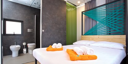Luxuscamping - WC - Bett - Camping Cikat Luxuriöse Mobilheime Typ Freed-Home auf Camping Cikat