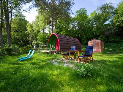 Luxuscamping - Terrasse - Glamping-Pod Waldemar - Naturcampingpark Rehberge Glamping-Pod Waldemar am Wurlsee - Naturcampingpark Rehberge