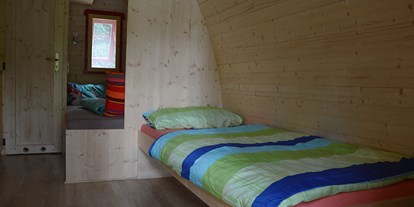 Luxuscamping - Art der Unterkunft: Hütte/POD - Deutschland - Einzelbett - Naturcampingpark Rehberge Glamping-Pod Waldemar am Wurlsee - Naturcampingpark Rehberge