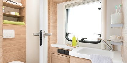 Luxuscamping - Kochmöglichkeit - Ostsee - Spül WC im Caravan - Mobilheime direkt an der Ostsee Glamping Caravan