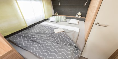 Luxuscamping - Art der Unterkunft: Campingfahrzeug - Ostsee - Elternschlafzimmer - Mobilheime direkt an der Ostsee Glamping Caravan