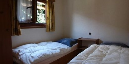Luxuscamping - Unterkunft alleinstehend - PLZ 3970 (Schweiz) - Getrennte Zimmer  - Camping Swiss-Plage Chalet am Camping Swiss-Plage