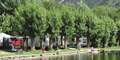 Luxuscamping - Unterkunft alleinstehend - PLZ 3970 (Schweiz) - Wunderschön am Wasser gelegen - Camping Swiss-Plage Wohnwagen auf Camping Swiss-Plage