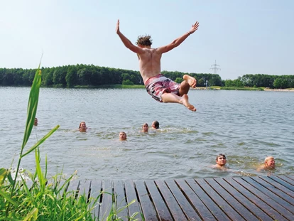 Luxury camping - Schwimmen im See - Freizeitpark "Am Emsdeich" Safari Zeltlodge mit exklusiver Ausstattung