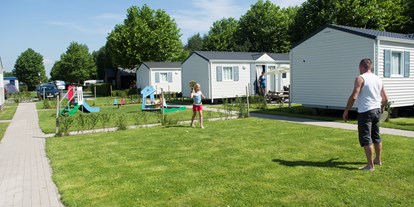 Luxuscamping - Terrasse - Westflandern - Camping Klein Strand Chalets für 4 Personen auf Camping Klein Strand