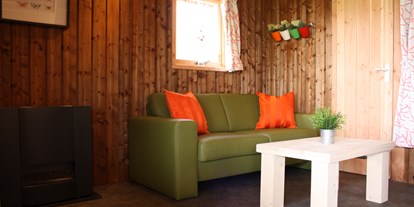 Luxuscamping - WC - Overijssel - Wohnraum - Camping De Kleine Wolf Klaverlodge auf Camping De Kleine Wolf