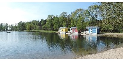 Luxuscamping - Art der Unterkunft: Bungalow - PLZ 46499 (Deutschland) - Dingdener Heide Seehaus direkt am See mit eigener Seeterrasse