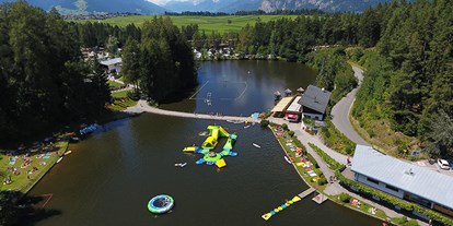 Luxuscamping - Österreich - Mega-Aqua Park - Nature Resort Natterer See Safari-Lodge-Zelt "Hippo" am Nature Resort Natterer See