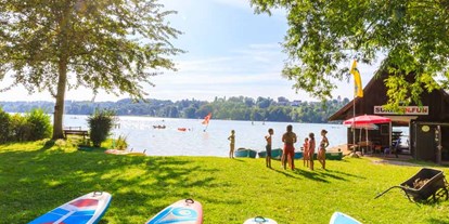 Luxuscamping - Preisniveau: moderat - Sup-Verleih am Campingplatz Pilsensee - Pilsensee in Bayern Jagdhäuschen am Pilsensee in Bayern
