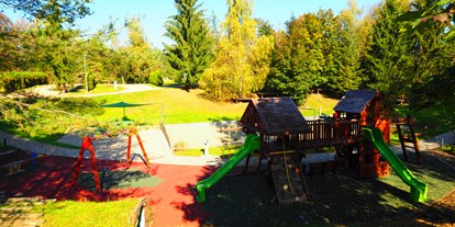 Luxuscamping - Terrasse - Kvarner - Spielplatz - Plitvice Holiday Resort Holzhaus auf Plitvice Holiday Resort
