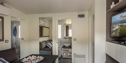 Luxuscamping - Rovinj - Campingplatz Porton Biondi - Meinmobilheim Mediteran Premium Seaview auf dem Campingplatz Porton Biondi