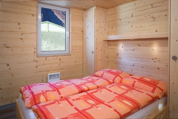 Glampingunterkunft: Doppelzimmer - Chalets Alpin am Camping de la Sarvaz