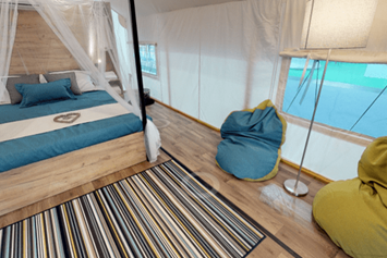 Glampingunterkunft: Lakeside romantic Tent Schlafzimmer mit Doppelbett - Lakeside romantic Tent im Lakeside Petzen Glamping Resort