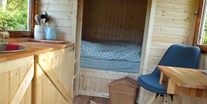 Luxuscamping - Art der Unterkunft: Zirkuswagen/Schäferwagen - Blaumeischen, Bett: 140x180 cm - Ecolodge Hinterland Bauwagen Lodge