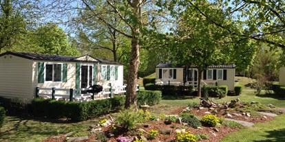 Luxuscamping - Preisniveau: moderat - Österreich - Mobilheim Außenansicht - Mobilheime auf Donaupark Camping Tulln