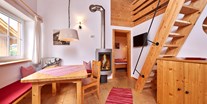 Luxuscamping - Wohnbereich Berghütte Premium - Berghütten Premium im Camping Resort Zugspitze