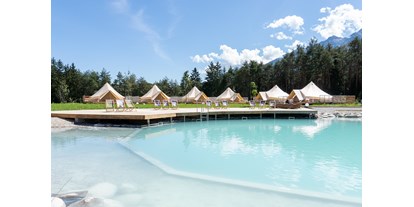 Luxuscamping - Bademöglichkeit für Hunde - Österreich - Glampingzelte in unmittelbarer Nähe des Natur Schwimmteiches - Sonnenplateau Camping Gerhardhof