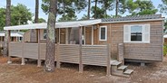 Luxuscamping - Terrasse - Camiers - Mobilheim Moda 6 Personen 3 Zimmer 2 Badezimmer von Vacanceselect auf Camping La Dune Blanche