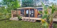 Luxuscamping - Gironde - Mobilheim Privilege Club 4 Pers 2 Zimmer Trop Dusche von Vacanceselect auf Camping Mayotte Vacances