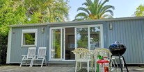 Luxuscamping - Mobilheim Moda 4 Personen 2 Zimmer Klimaanlage von Vacanceselect auf Camping La Sirène