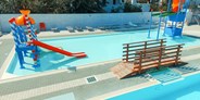 Luxuscamping - Emilia Romagna - Mobilheim Moda 5/6 Personen 2 Zimmer Klimaanlage von Vacanceselect auf Camping Mare e Pineta