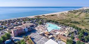 Luxuscamping - Hérault - Lodgezelt 4/5 Pers 2 Zimmer BZ von Vacanceselect auf Camping Les Méditerranées - Beach Garden