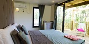 Luxuscamping - Umgebungsschwerpunkt: See - Peschiera del Garda - Cubesuite 2/3 Personen von Vacanceselect auf Camping Bella Italia