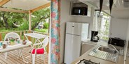 Luxuscamping - Gardasee - Mobilheim Moda 4/5 Personen 2 Zimmer Klimaanlage von Vacanceselect auf Camping Cisano & San Vito