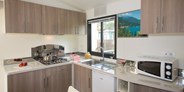 Luxuscamping - Gardasee - Mobilheim Moda 5/6 Personen 2 Zimmer Klimaanlage von Vacanceselect auf Camping Cisano & San Vito