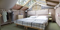Luxuscamping - Airlodge 4 Personen 2 Zimmer Badezimmer von Vacanceselect auf Camping Romagna Village