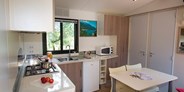 Luxuscamping - Livorno - Mobilheim Moda 5/6 Personen 2 Zimmer Klimaanlage von Vacanceselect auf Camping Le Pianacce