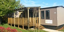 Luxuscamping - Mobilheim Moda 6 Pers 3 Zimmer AC 2 Badezimmer von Vacanceselect auf Camping 4 Mori Family Village